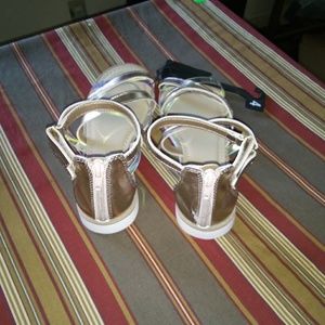 Metallic pink gladiator shoes size 4